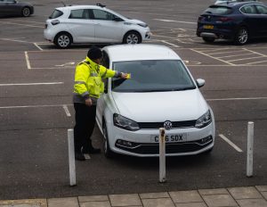 Traffic Enforcement Officer Giving a Ticket. Airsys.Cloud in local authorities - law enforcement.